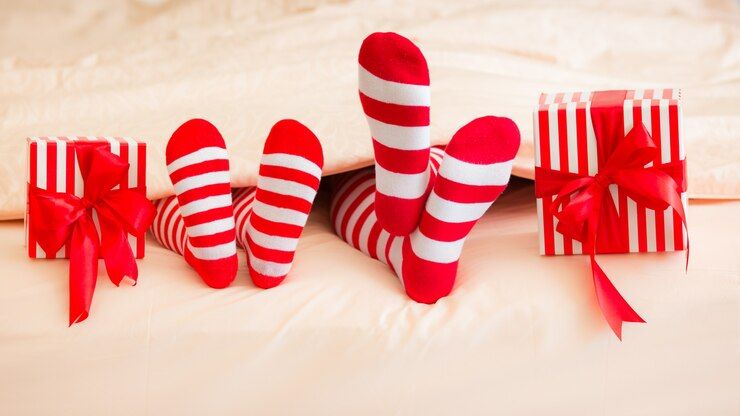 family-christmas-socks-lying-bed_411285-3506.jpg